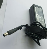 HP big pin 65W charger – brick close-up